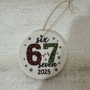 Festive 6 7 Holiday Ceramic Ornament with Red and Green Design with 2025 date.